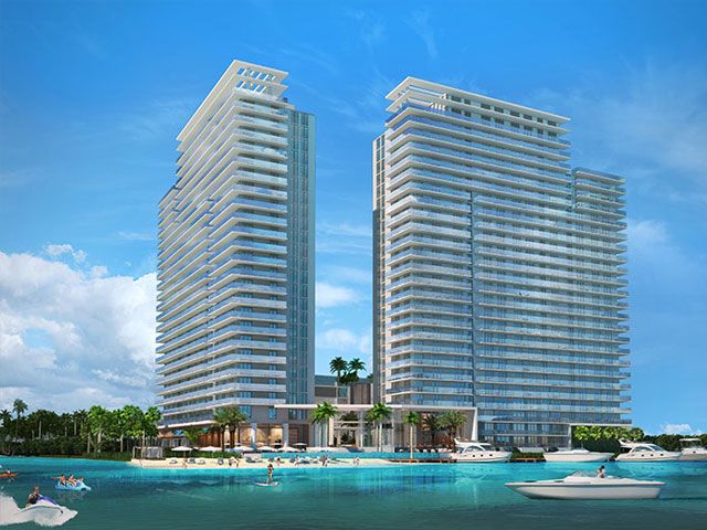 two building render of a hotel right on the water with people on jetskis and boats